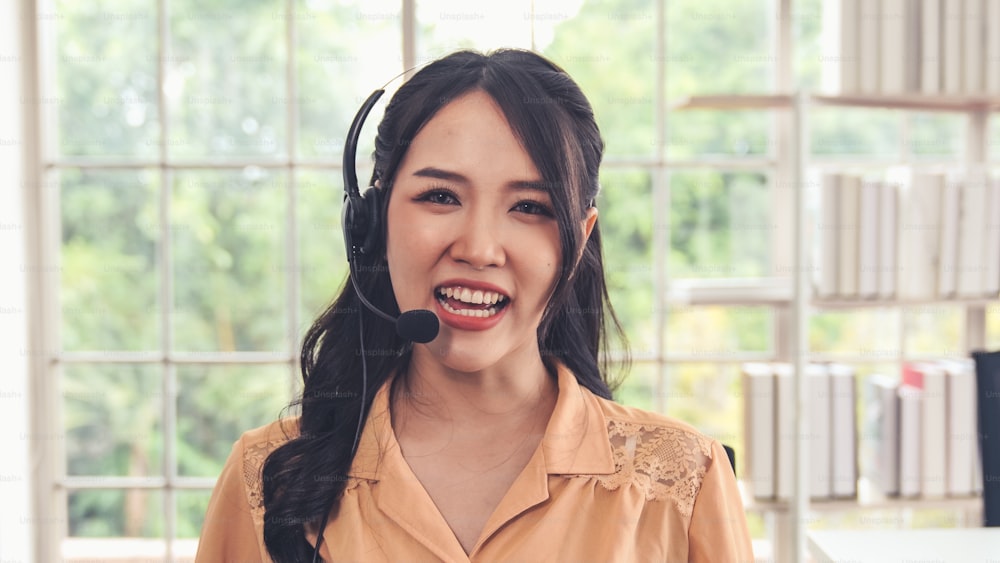 Video call camera view of businesswoman talks actively in videoconference . Call center, telemarketing, customer support agent provide service on telephone video conference call.