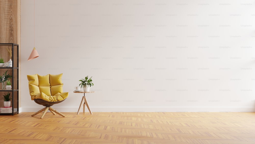 Modernes minimalistisches Interieur mit einem gelben Sessel auf leerem weißen Wandhintergrund.3d Rendering