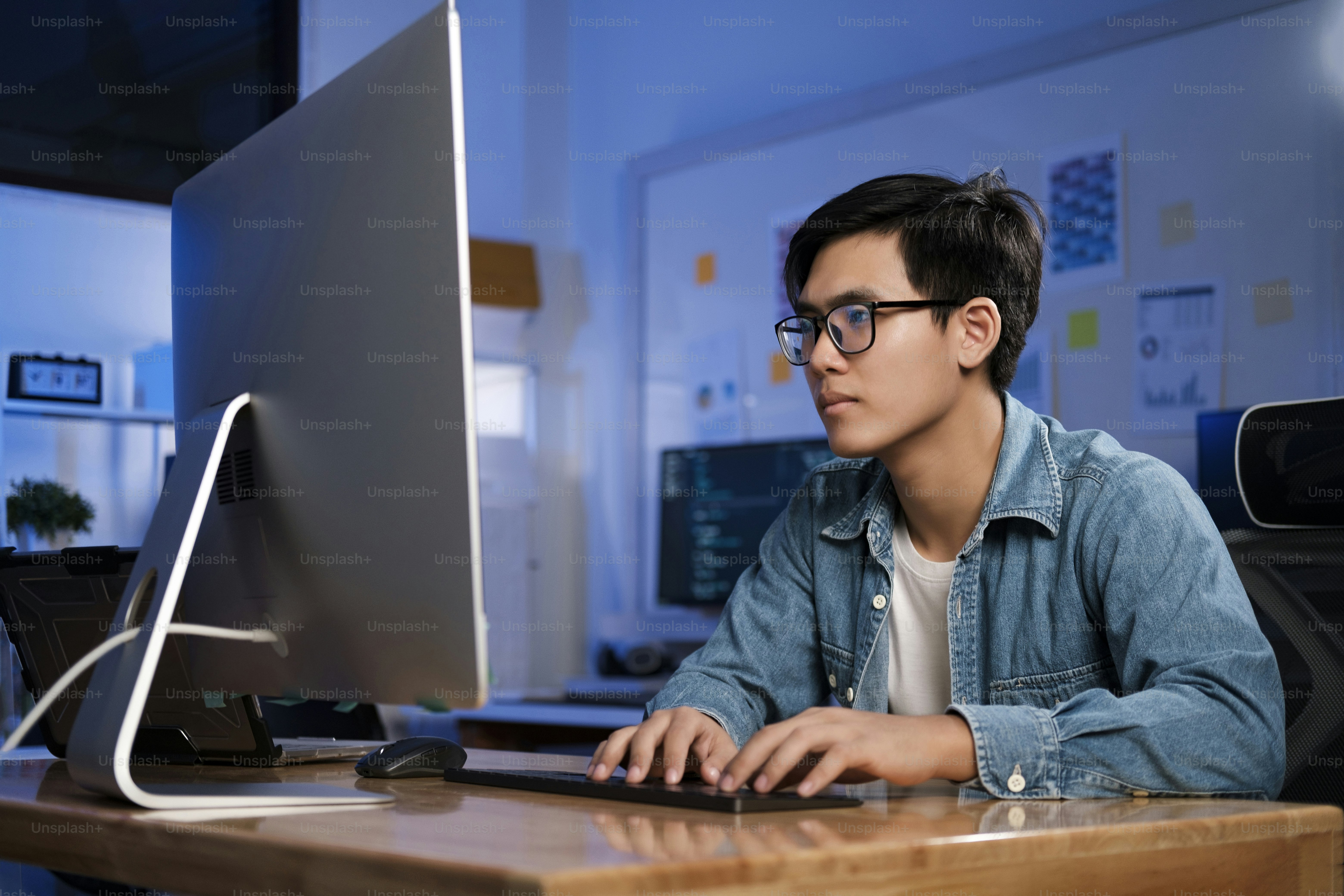 Programmers and developer teams are coding and developing software.