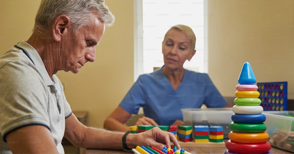 Photo of hand function training of stroke male patient by using various ...
