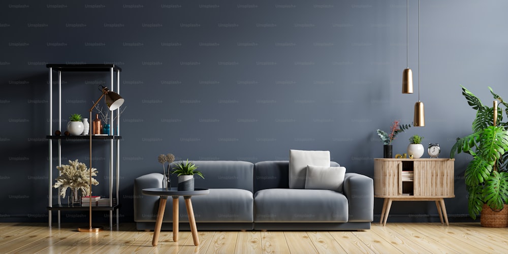 Maquete do interior da sala de estar com sofá no fundo vazio da parede azul escuro.3D renderização