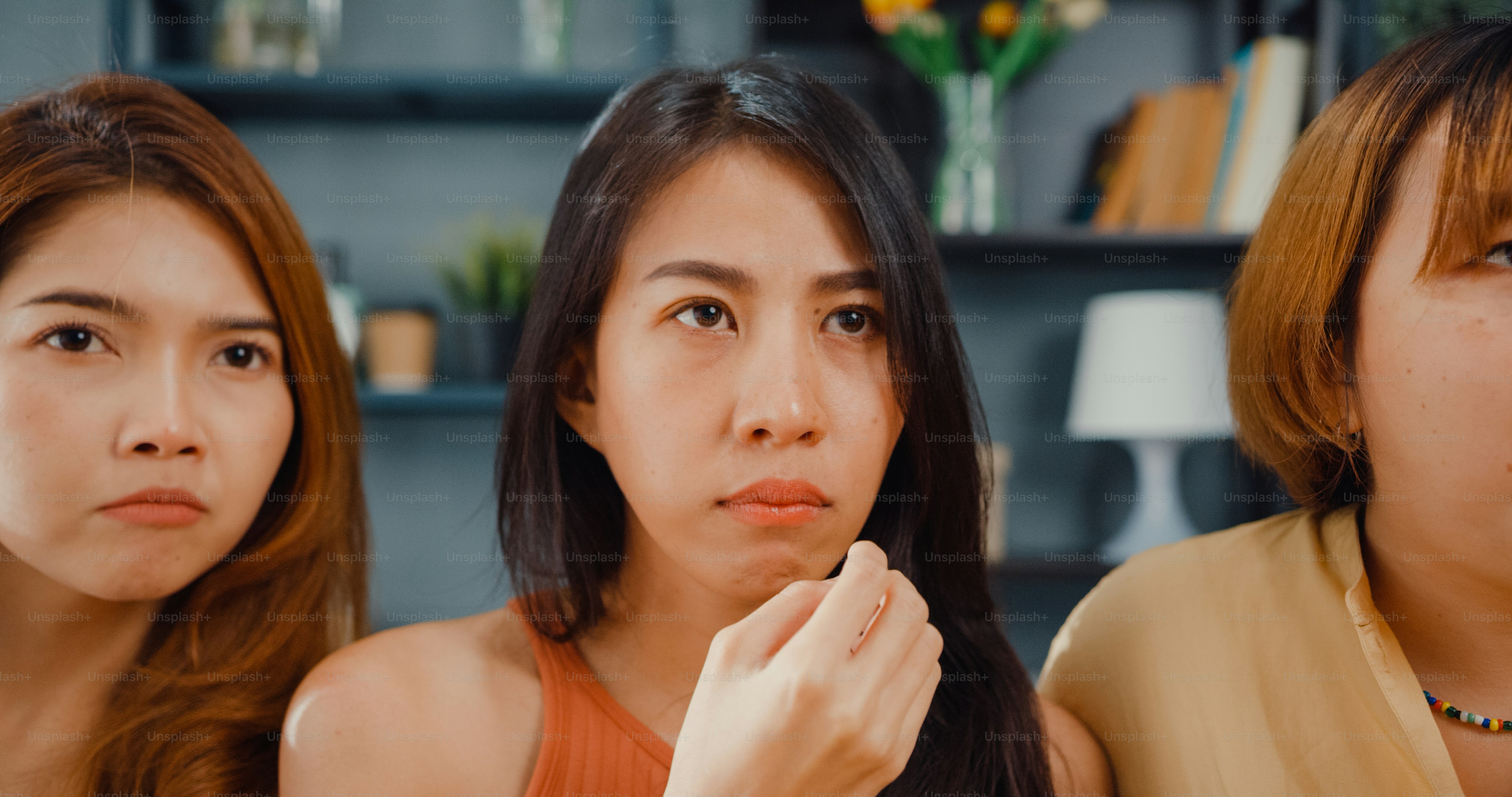 Attractive Asian lovely lady girl group positive glad cheerful with casual have fun and enjoy watch online movie entertainment on couch in living room at home.