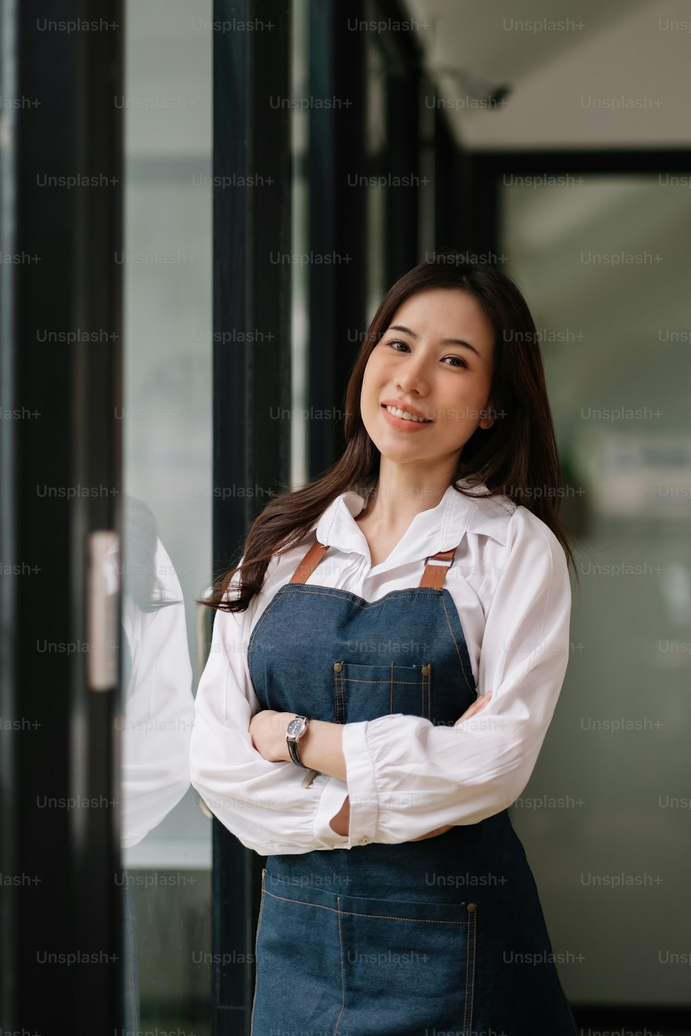 Portrait of Startup successful small business owner in coffee shop.handsome woman barista cafe owner. SME entrepreneur seller business concept.