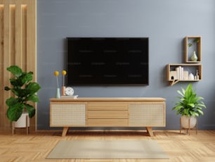 Fondo de pared de color azul oscuro, decoración moderna de la sala de estar con tv y gabinete renderizado .3d