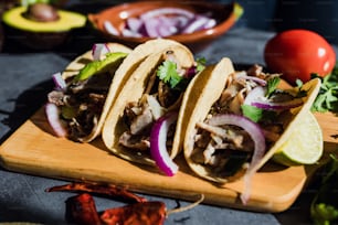 Mexican tacos al pastor with red sauce in Mexico city in Latin America