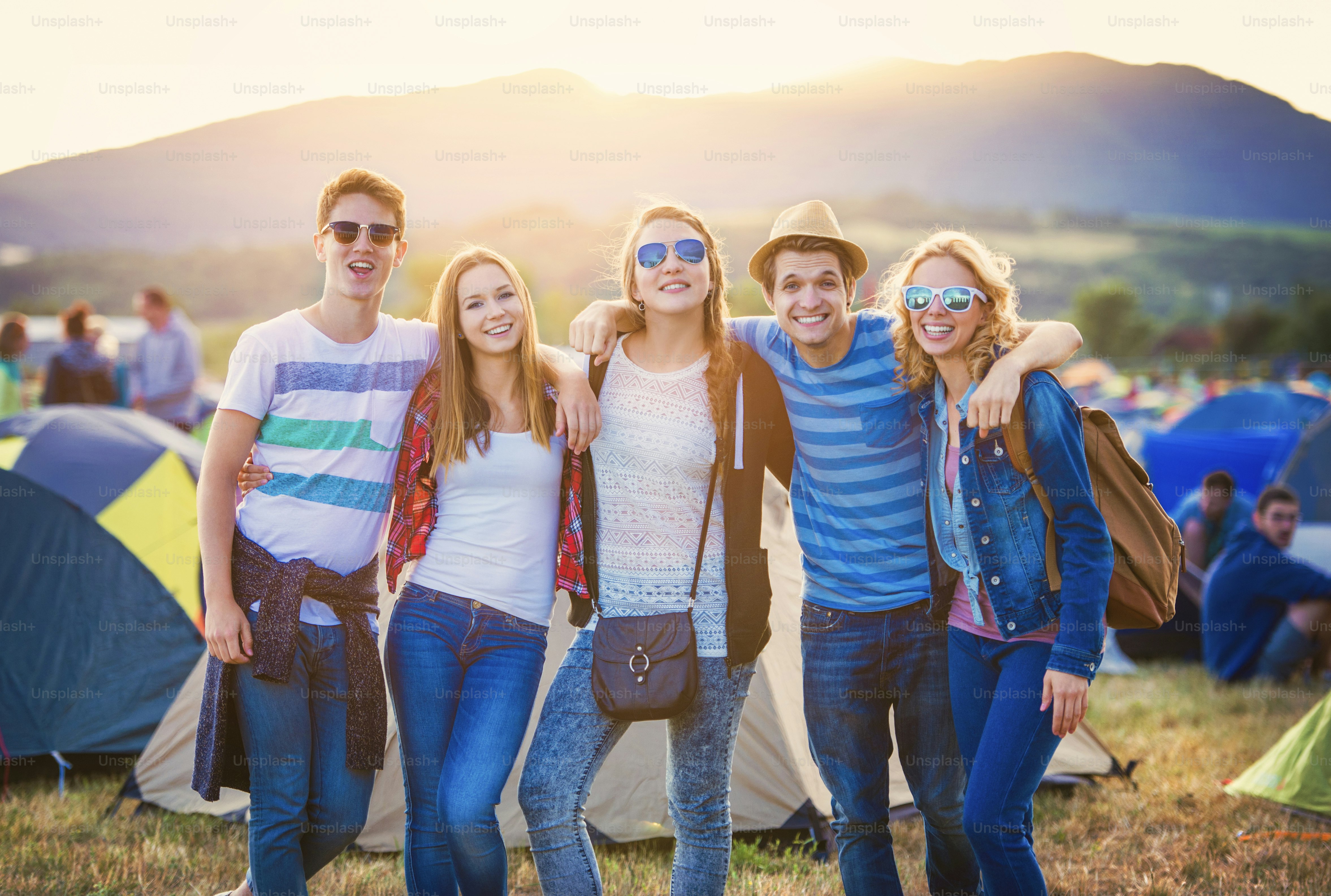 Group of beautiful teens at summer festival