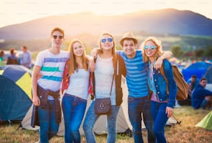 Group of beautiful teens at summer festival