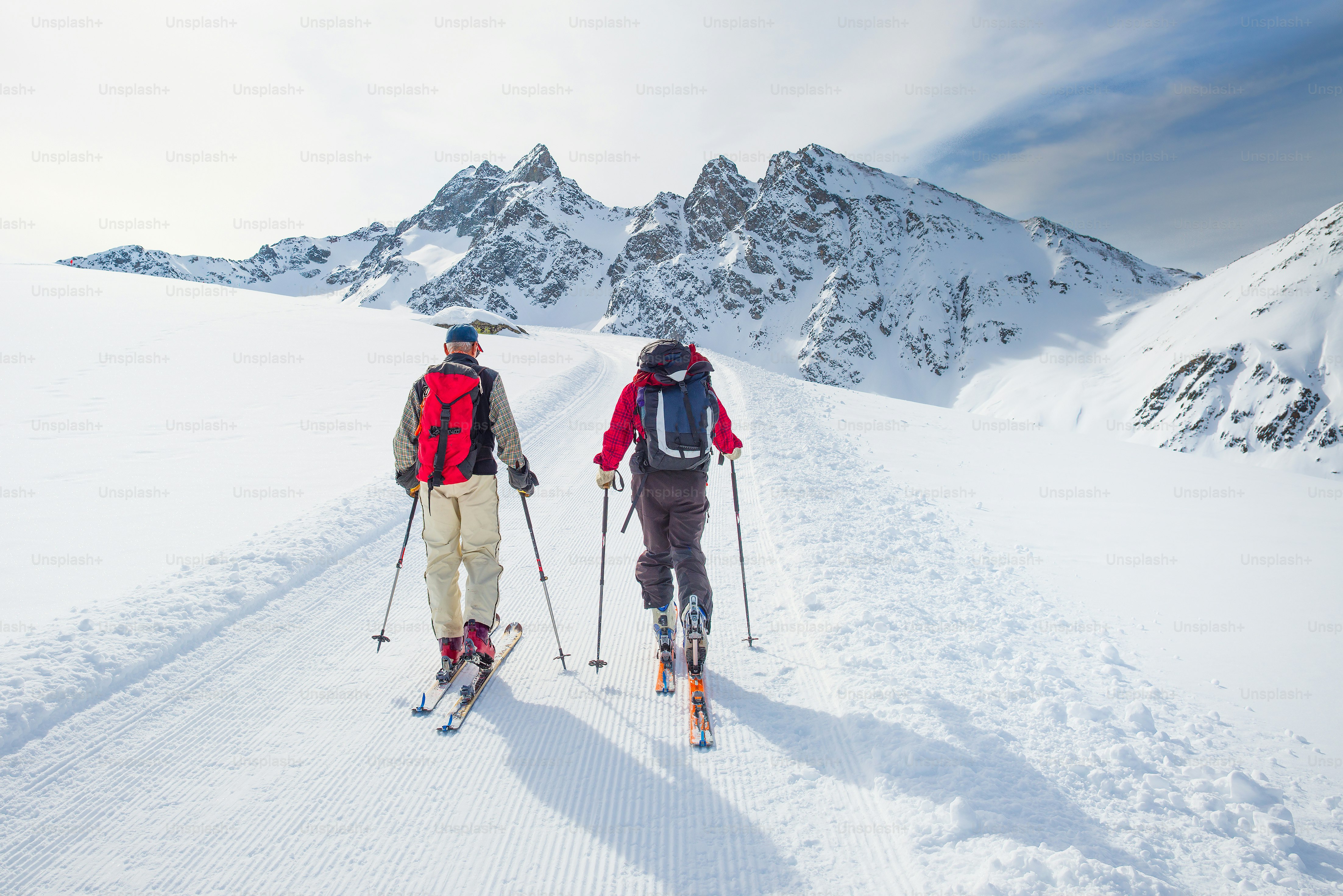 Group of climbers roped to the summit in the winter