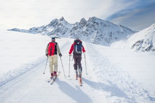 Group of climbers roped to the summit in the winter