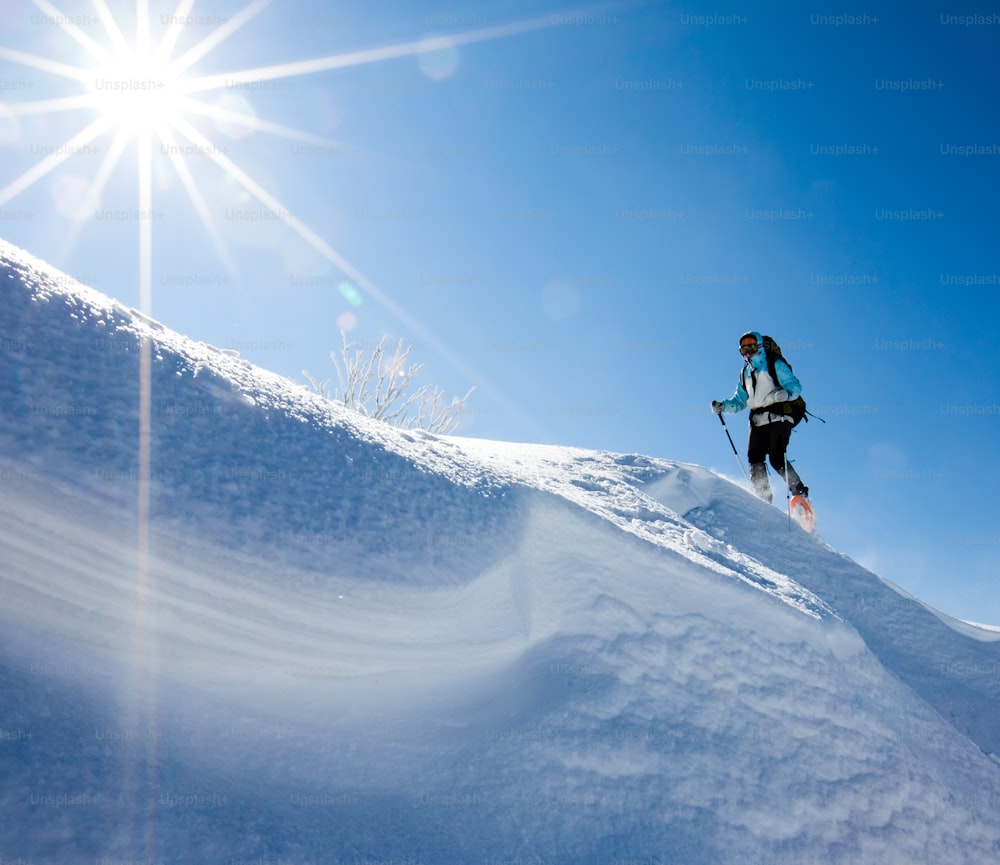 Hiker in winter mountains