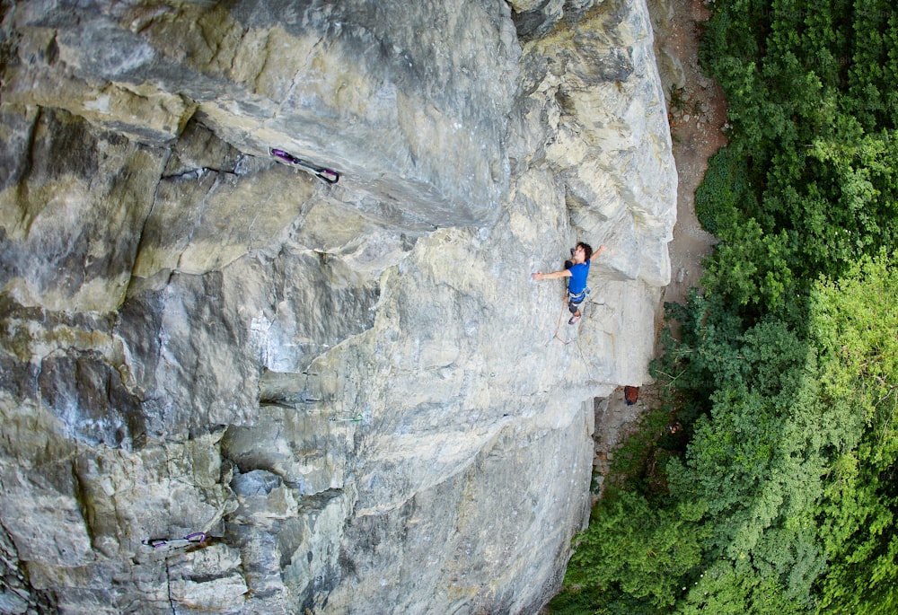 male rock climber. rock climber climbs on a rocky wall.