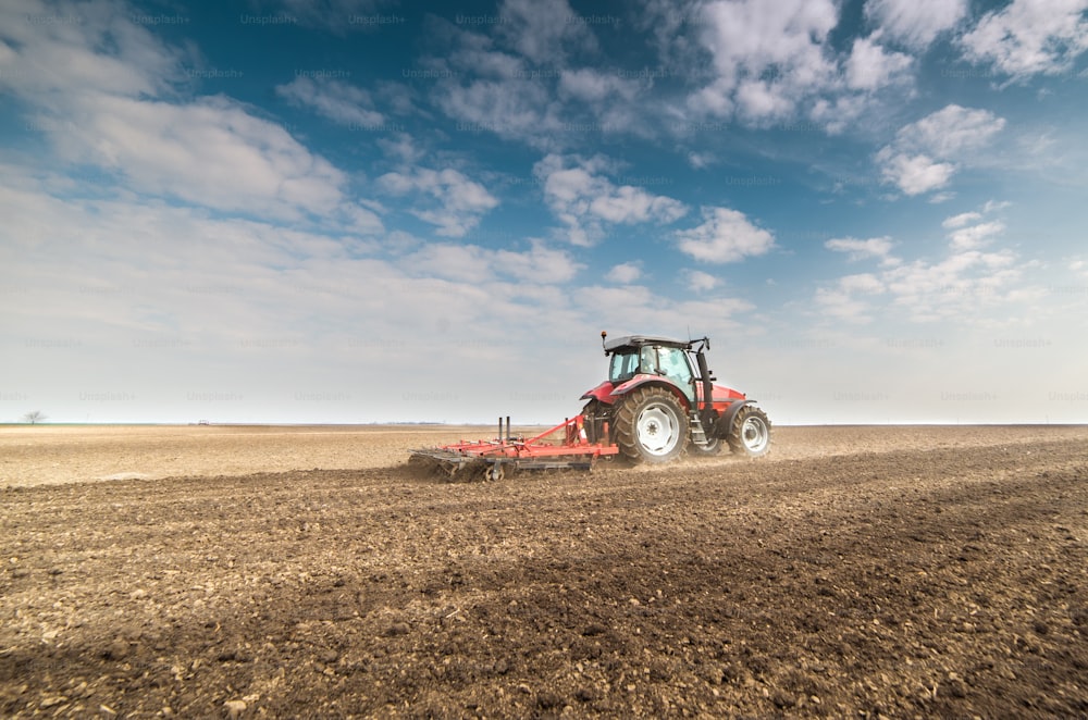 Tractor preparing land for sowing