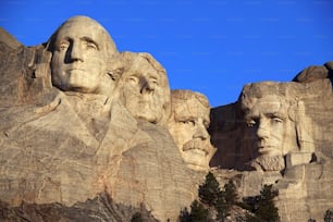 a group of presidents carved into the side of a mountain