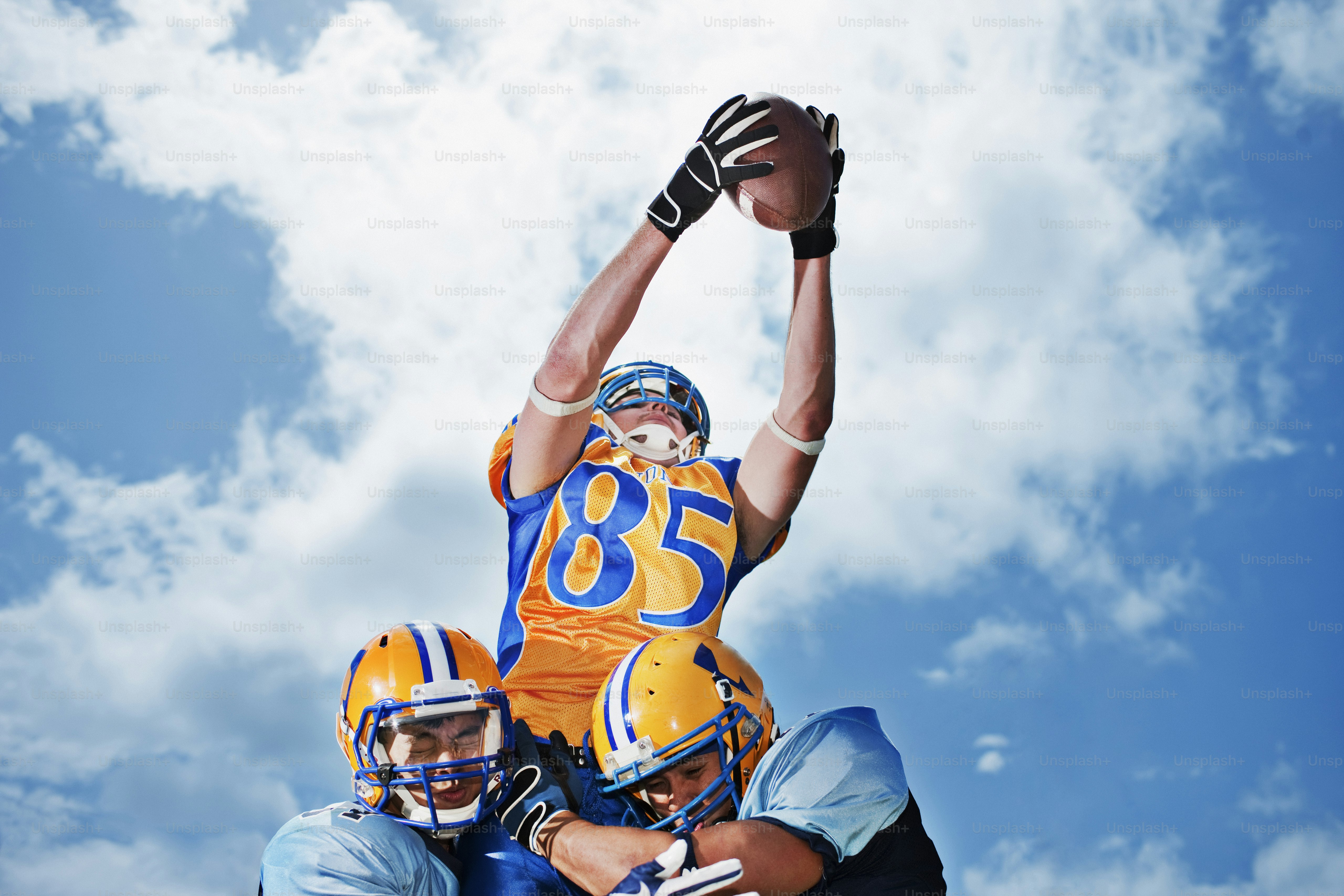 a couple of people that are in the air