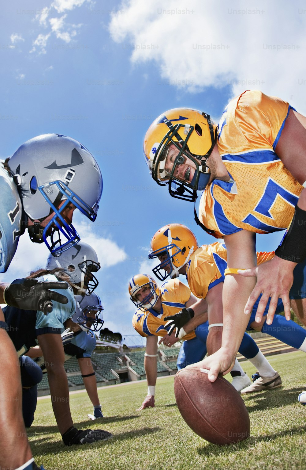 a group of young men playing a game of football