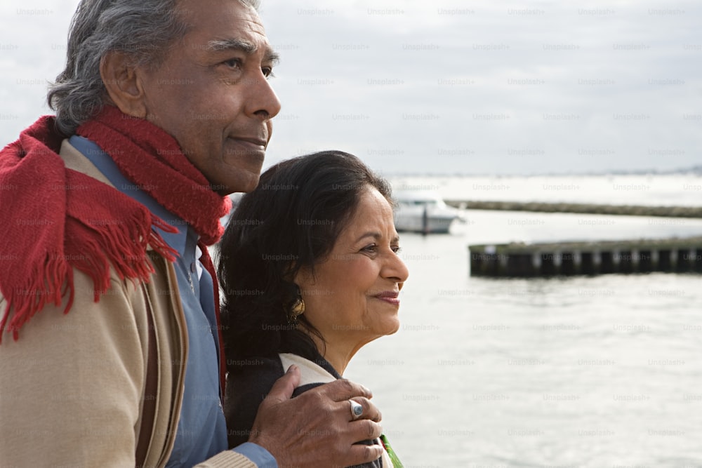 a man and a woman standing next to each other