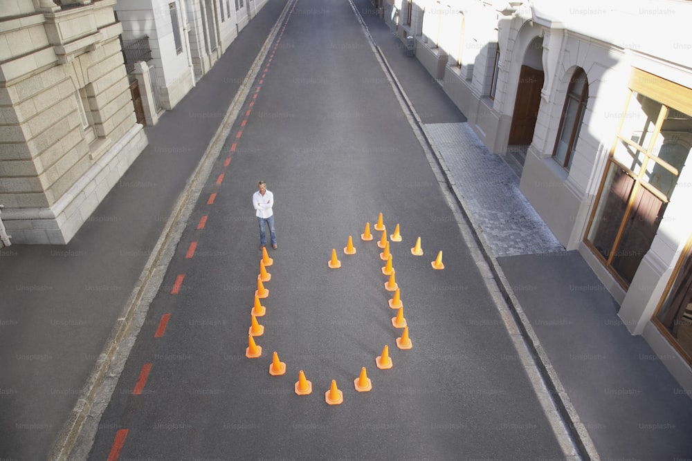 a man standing in the middle of an empty street