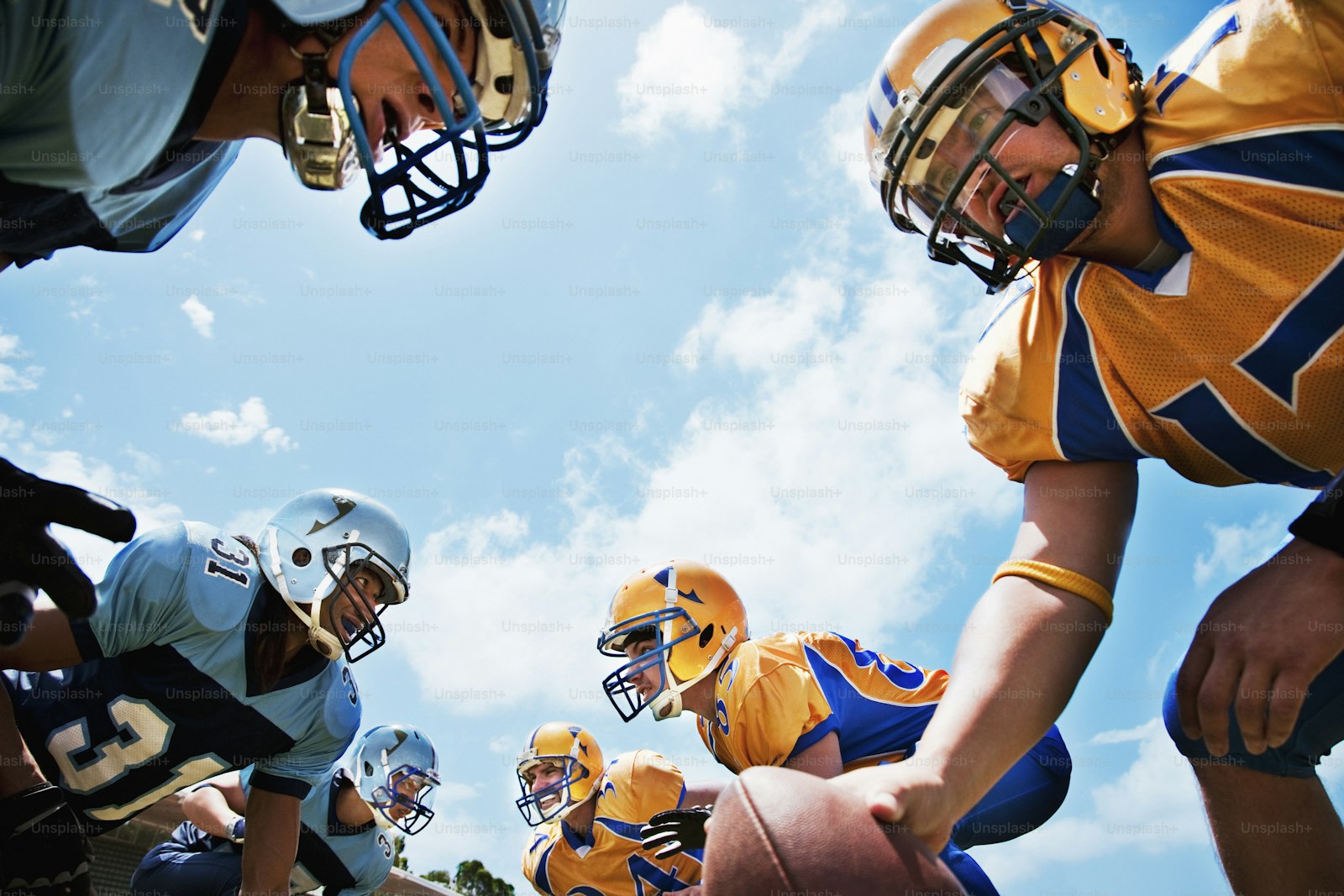 A group of young men playing a game of football