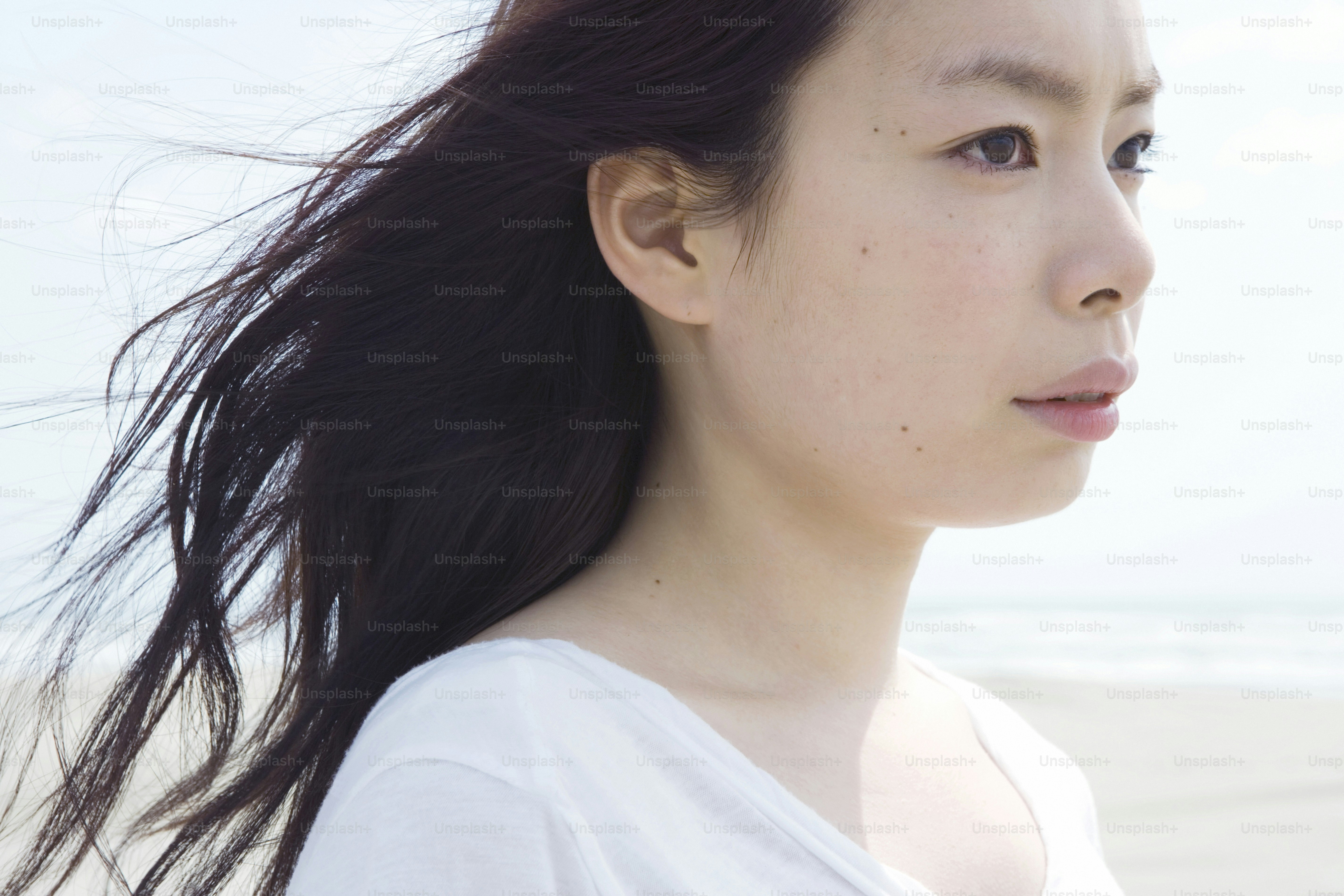 a close up of a person with long hair