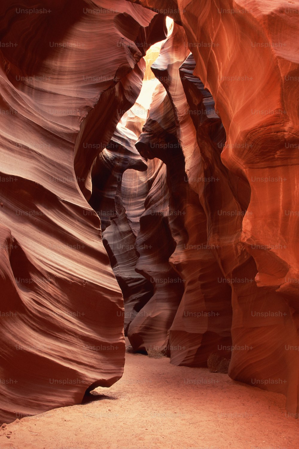 a narrow slot in the side of a canyon