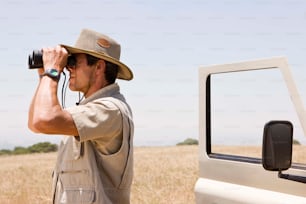 a man taking a picture of a truck with a camera