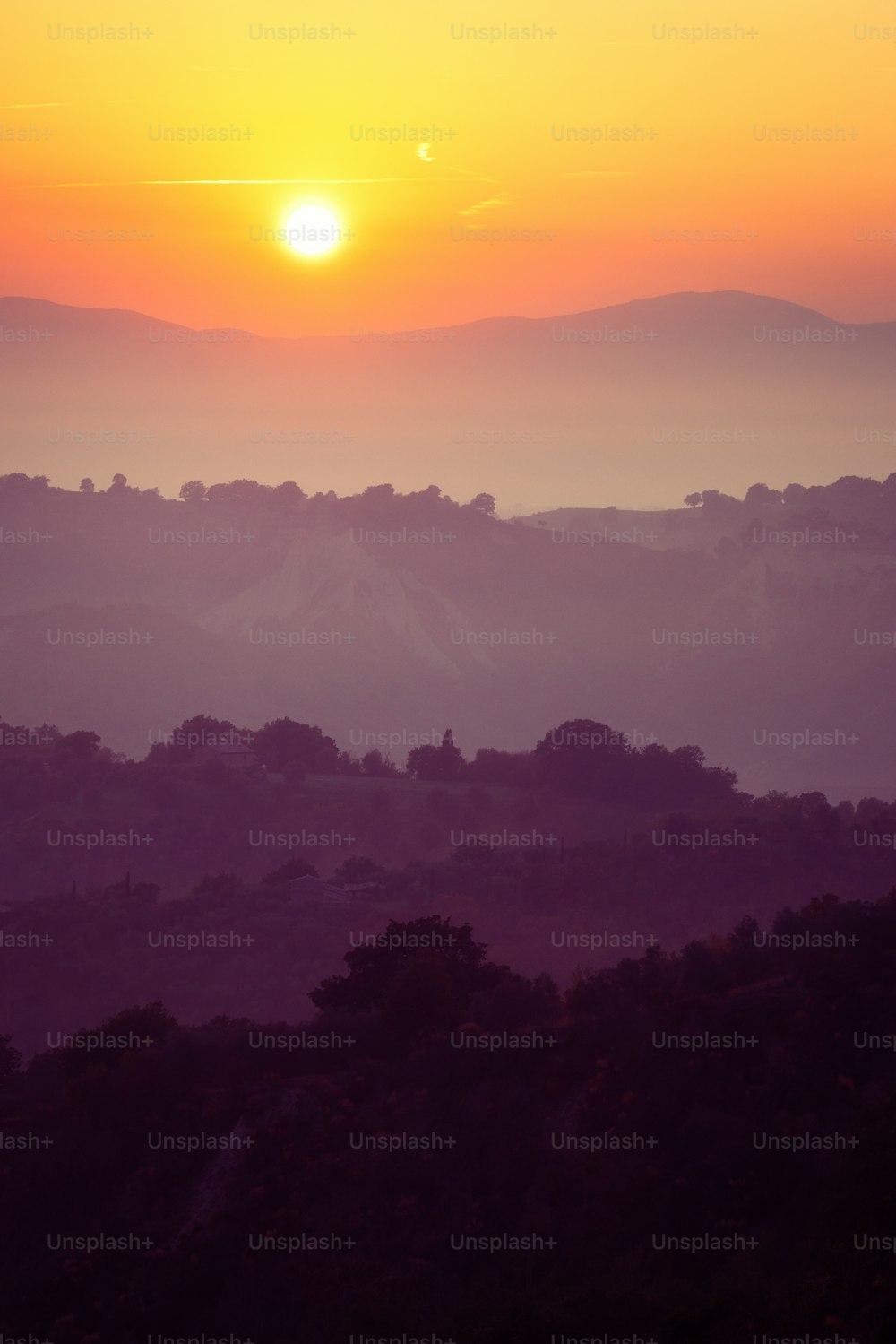 Beautiful sunrise overlooking mountain landscape in the summer morning.