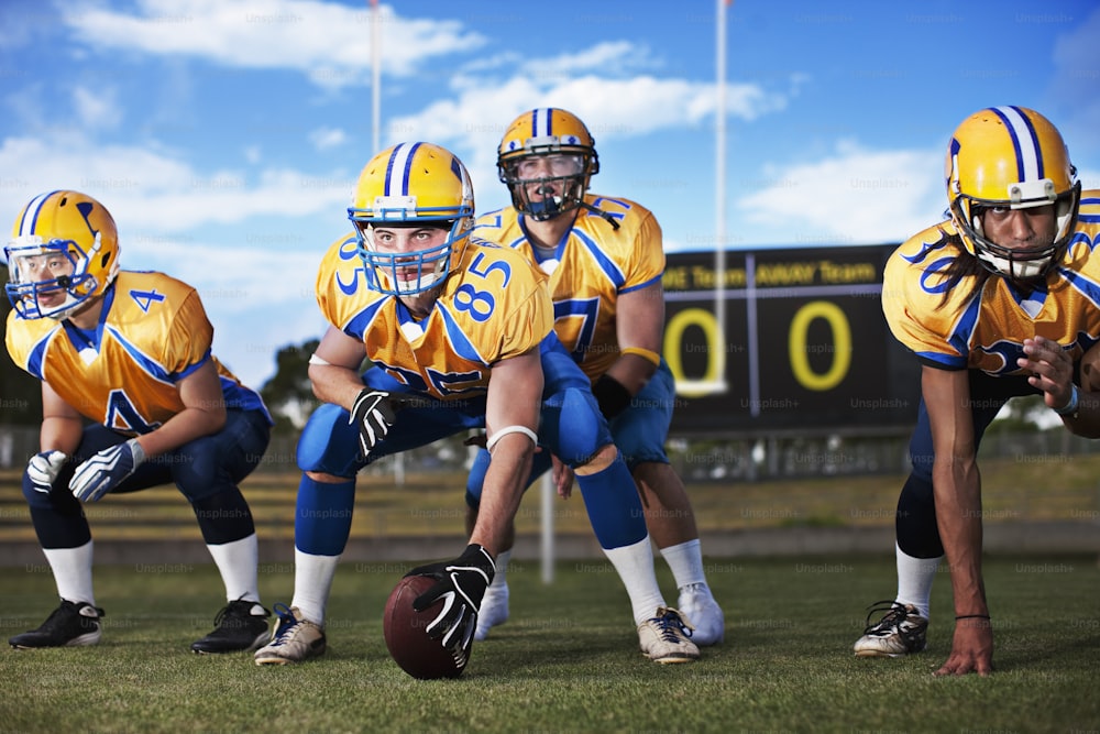 a group of young men playing a game of football