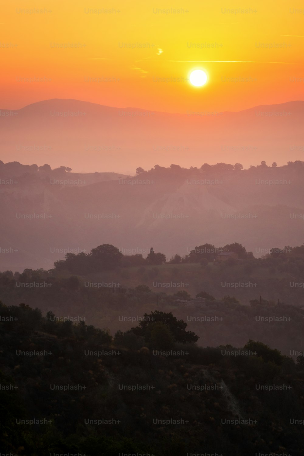 Beautiful sunrise overlooking mountain landscape in the summer morning.