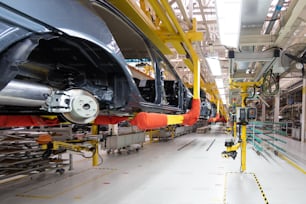 Automated car Assembly line. plant of automotive industry. Shop for production and Assembly of machines bottom view