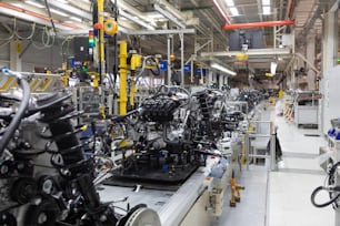 Automated Assembly line of car mechanics. Automobile industry plant