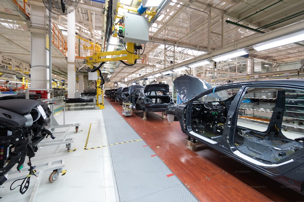 Automated car Assembly line. The plant of the automotive industry. Line of car body