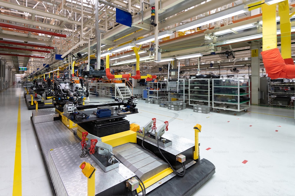 Automated car Assembly line. plant of automotive industry. Shop for production and Assembly of machines. New car warehouse