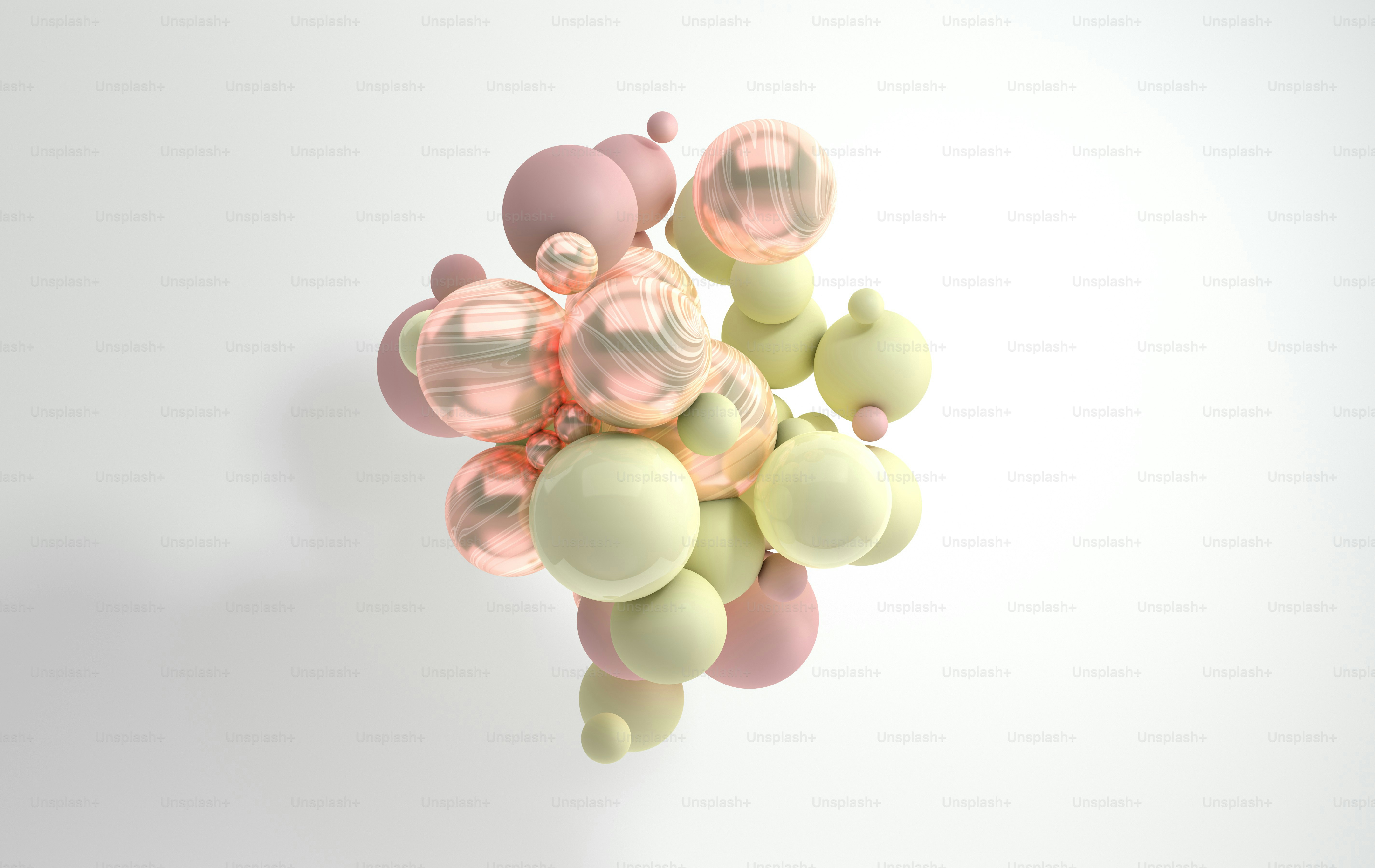 3d rendering of floating polished spheres on pink background. Abstract ...