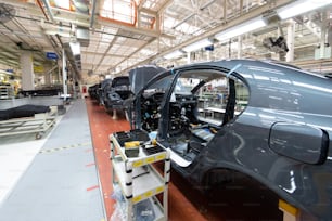 Automated car Assembly line. The plant of the automotive industry. Line of car body