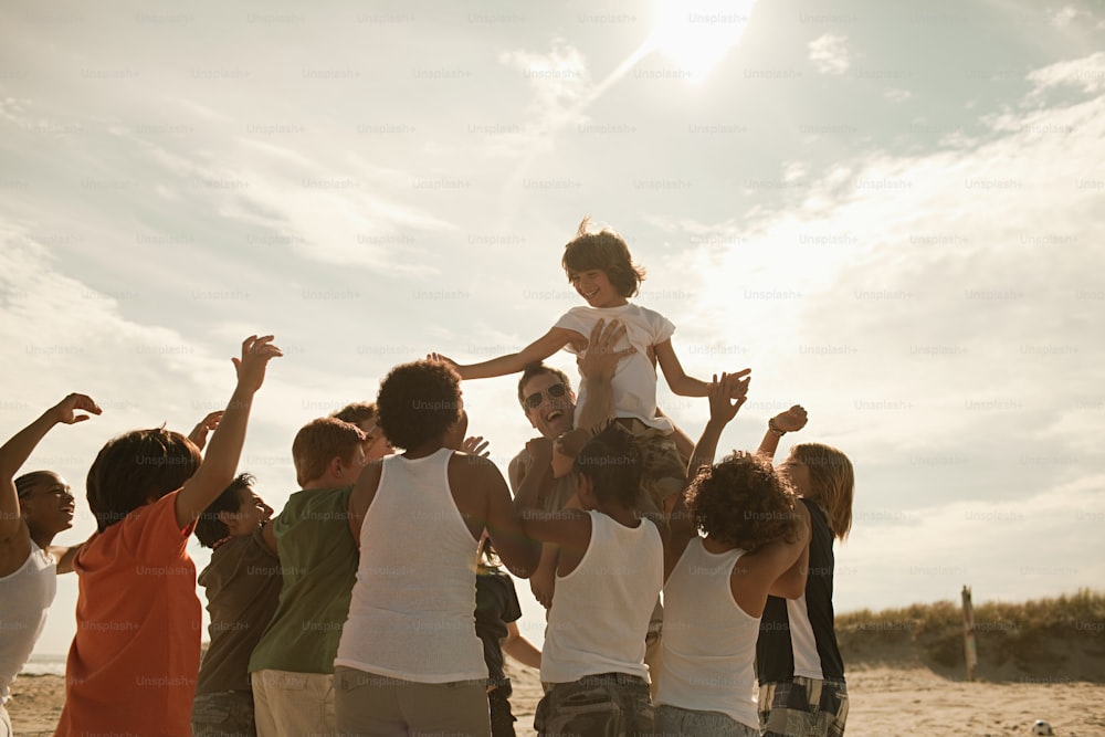 a group of people standing on top of each other