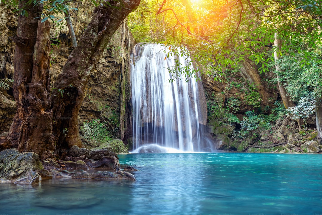 Erawan waterfall in Thailand. Beautiful waterfall with emerald pool in nature.