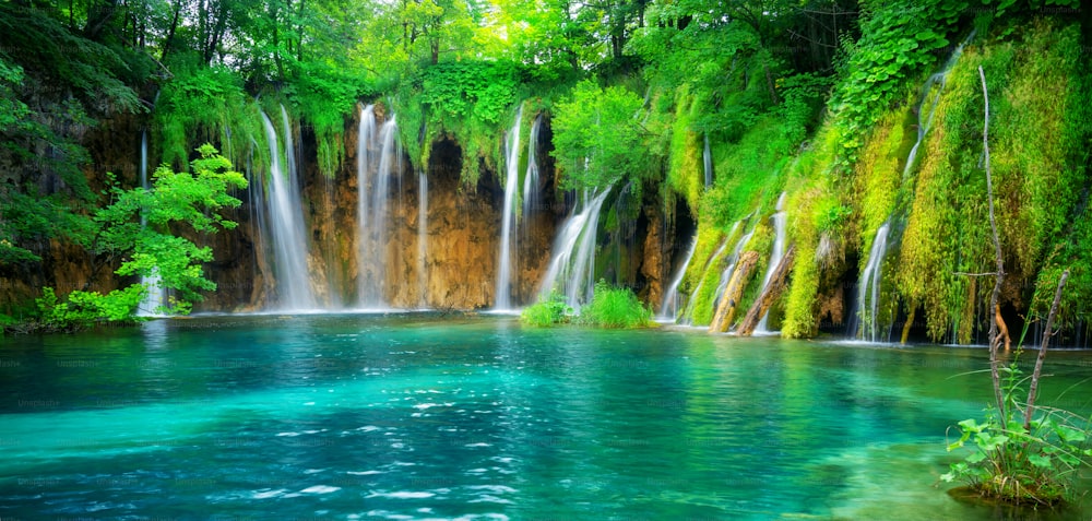 Exotic waterfall and lake landscape of Plitvice Lakes National Park, UNESCO natural world heritage and famous travel destination of Croatia. The lakes are located in central Croatia (Croatia proper).