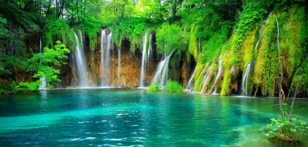 Exotic waterfall and lake landscape of Plitvice Lakes National Park, UNESCO natural world heritage and famous travel des