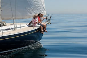 a couple of people that are sitting on a boat