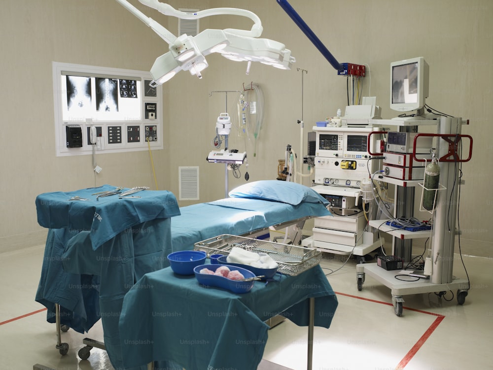 a hospital room with medical equipment and medical equipment