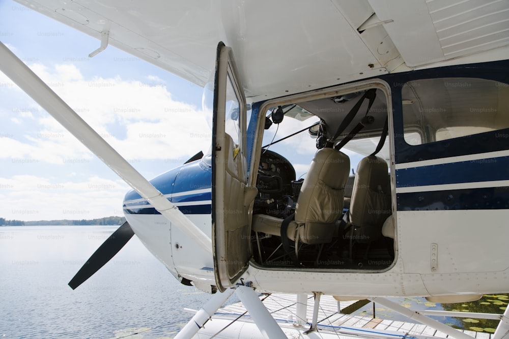 the cockpit of a small plane on the water