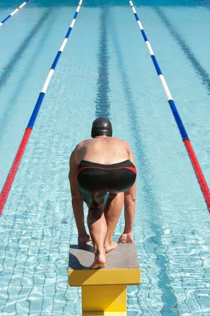 Tall Athletic Man Turning Back Near the Pool. Stock Photo - Image of  athlete, standing: 192003468