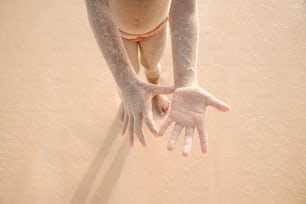 a person with their hands in the air