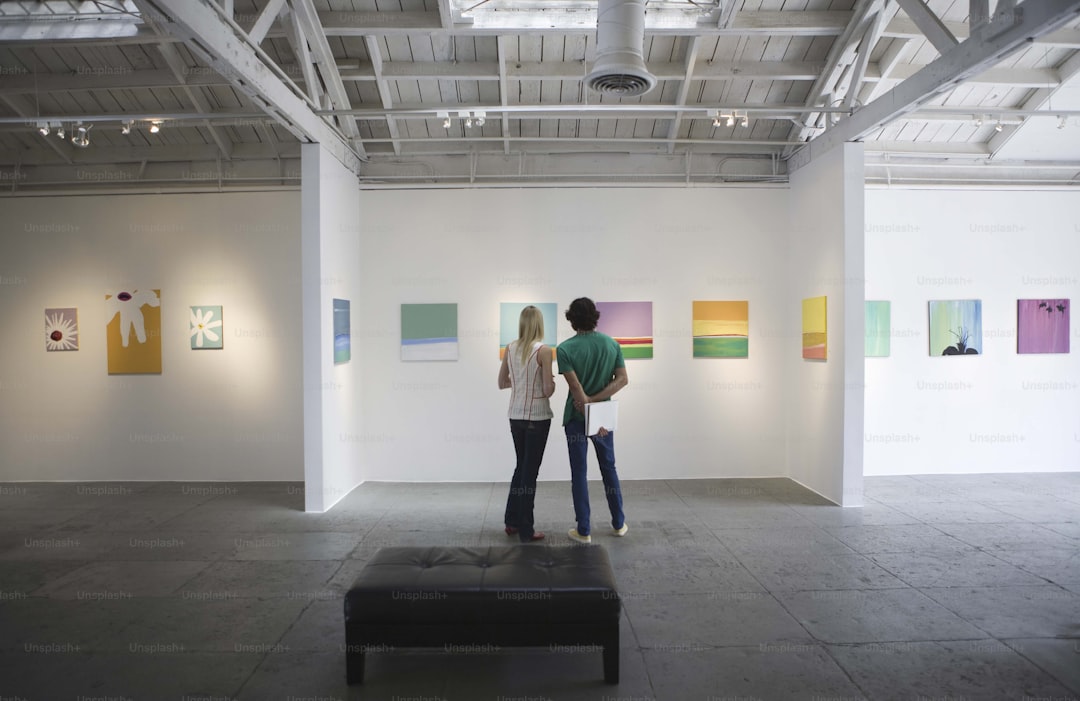 a couple of people that are standing in a room