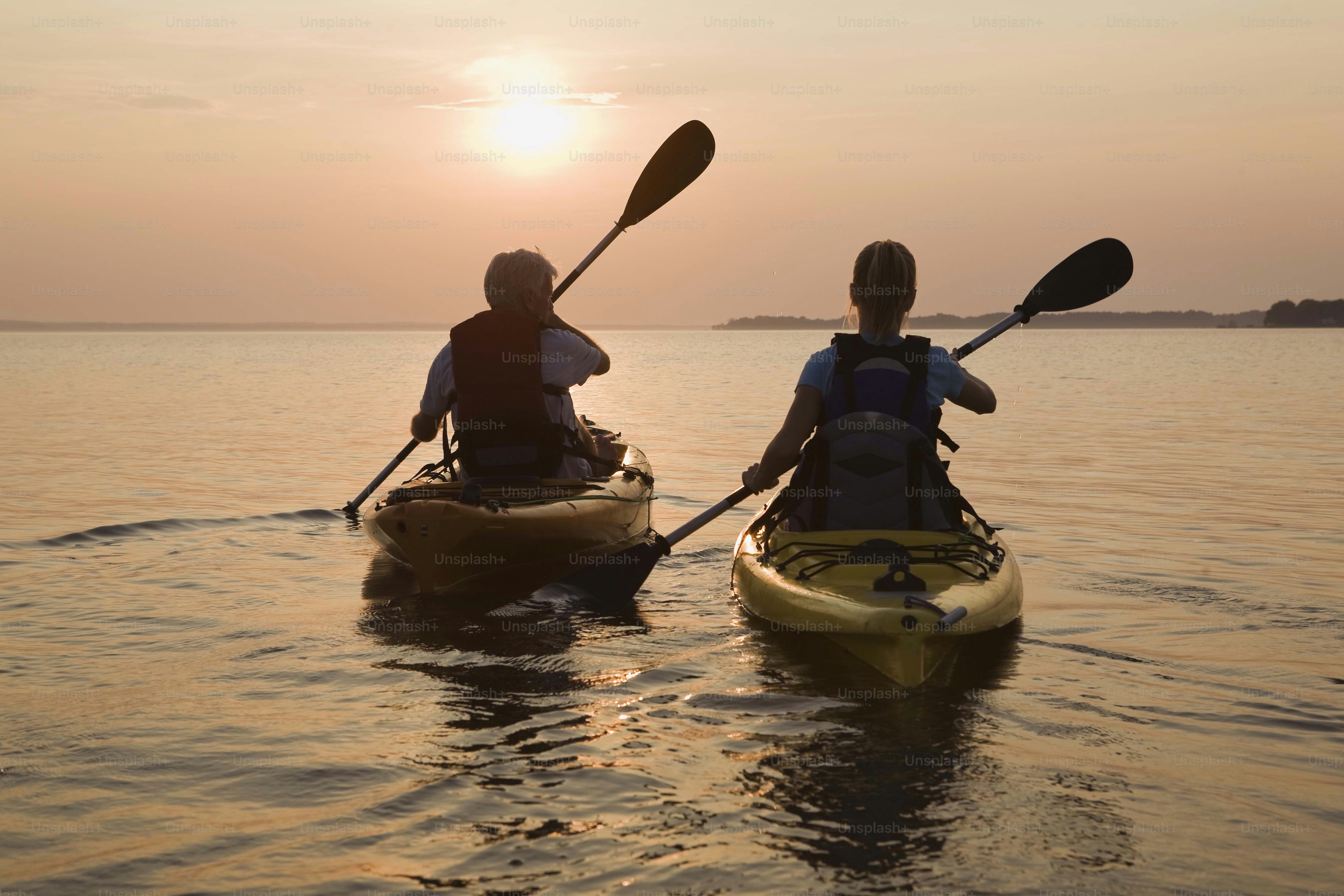 a couple of people that are in some kayaks