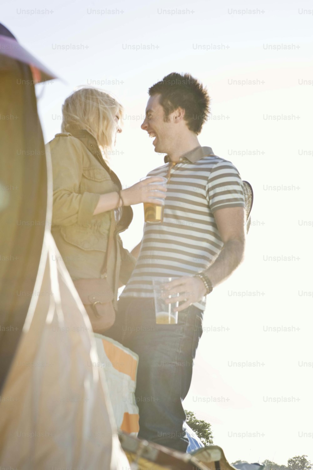 a man and a woman standing next to each other