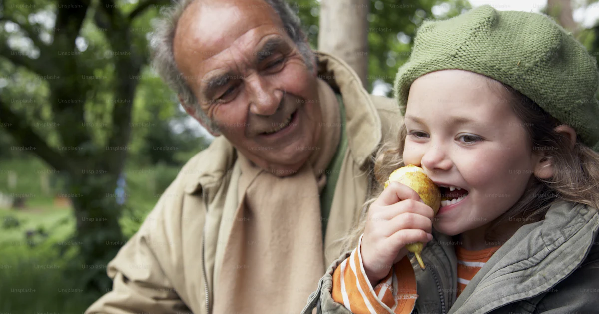 An Older Man And A Young Girl Eating Food Photo Adult Image On Unsplash an-older-man-and-a-young-girl-eating-food-photo-adult-image-on-unsplash