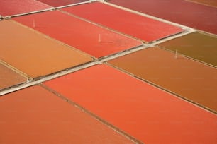 an aerial view of a field with many different colors
