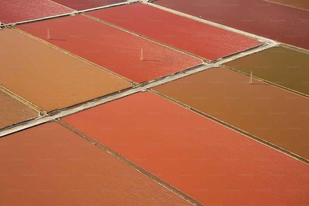 an aerial view of a field with many different colors