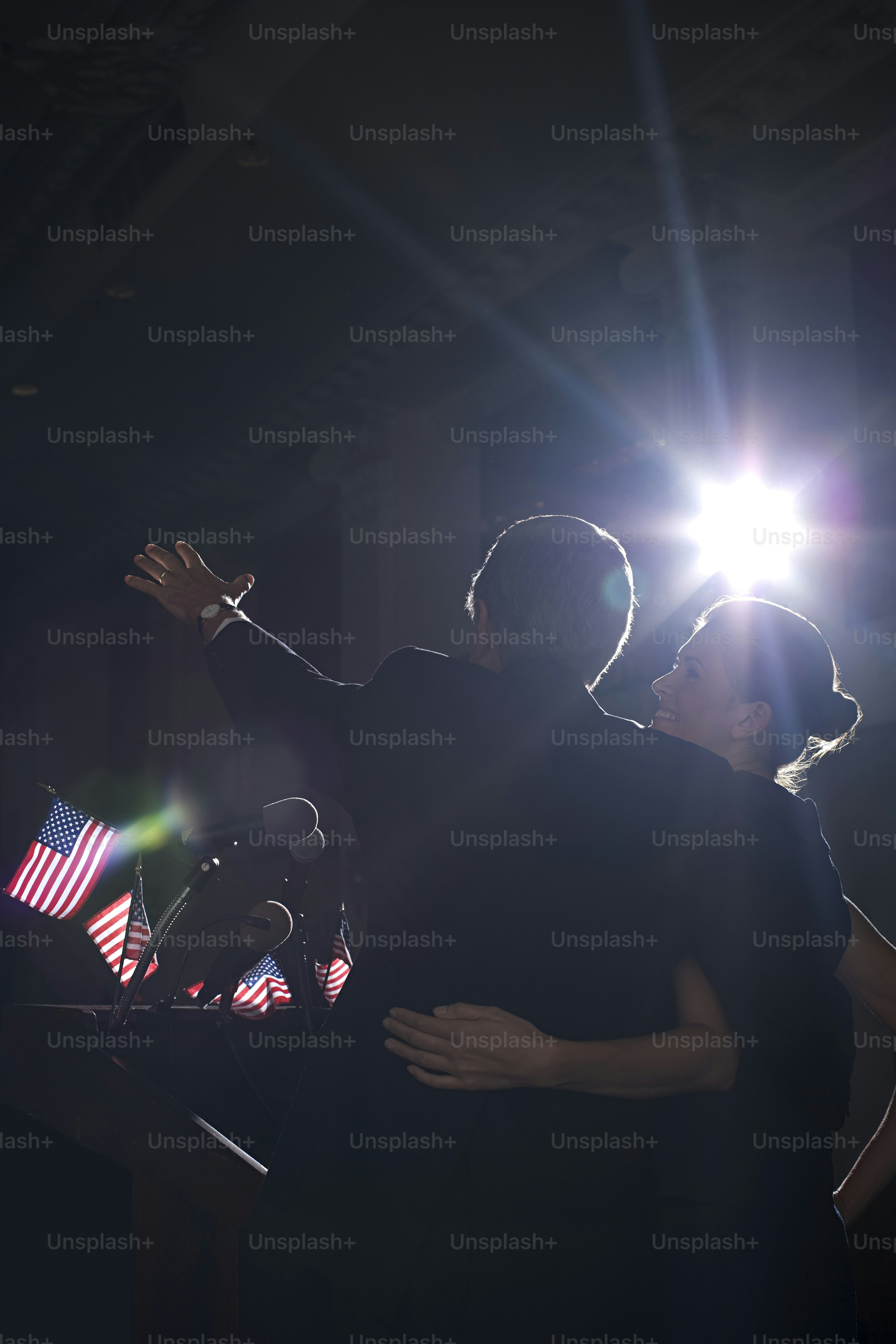 a man and a woman standing next to each other